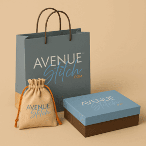 Gray paper bag, blue gift box, and beige drawstring pouch with “Avenue Stitch” logo